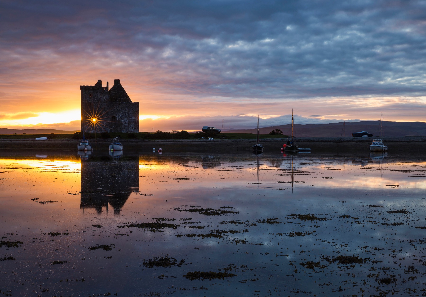 Lochranza Castle on the Isle of Arran at sunset